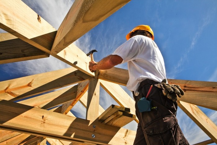 weather resistors careers image of guy building roof